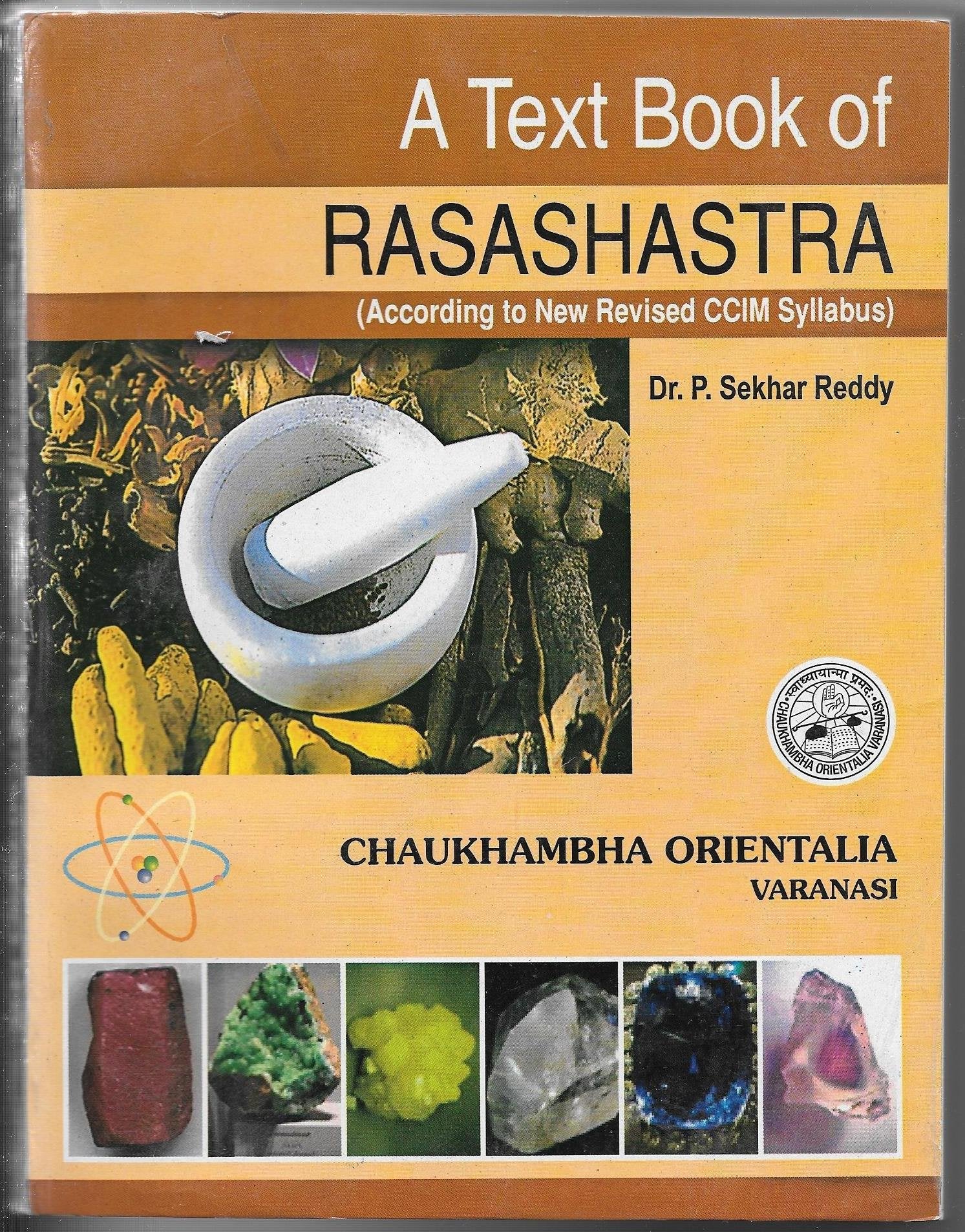 This image features the cover of a book titled "A Text Book of RASASHAstra" by Dr. P. , available at kerala ayurveda's collection of ayurveda books