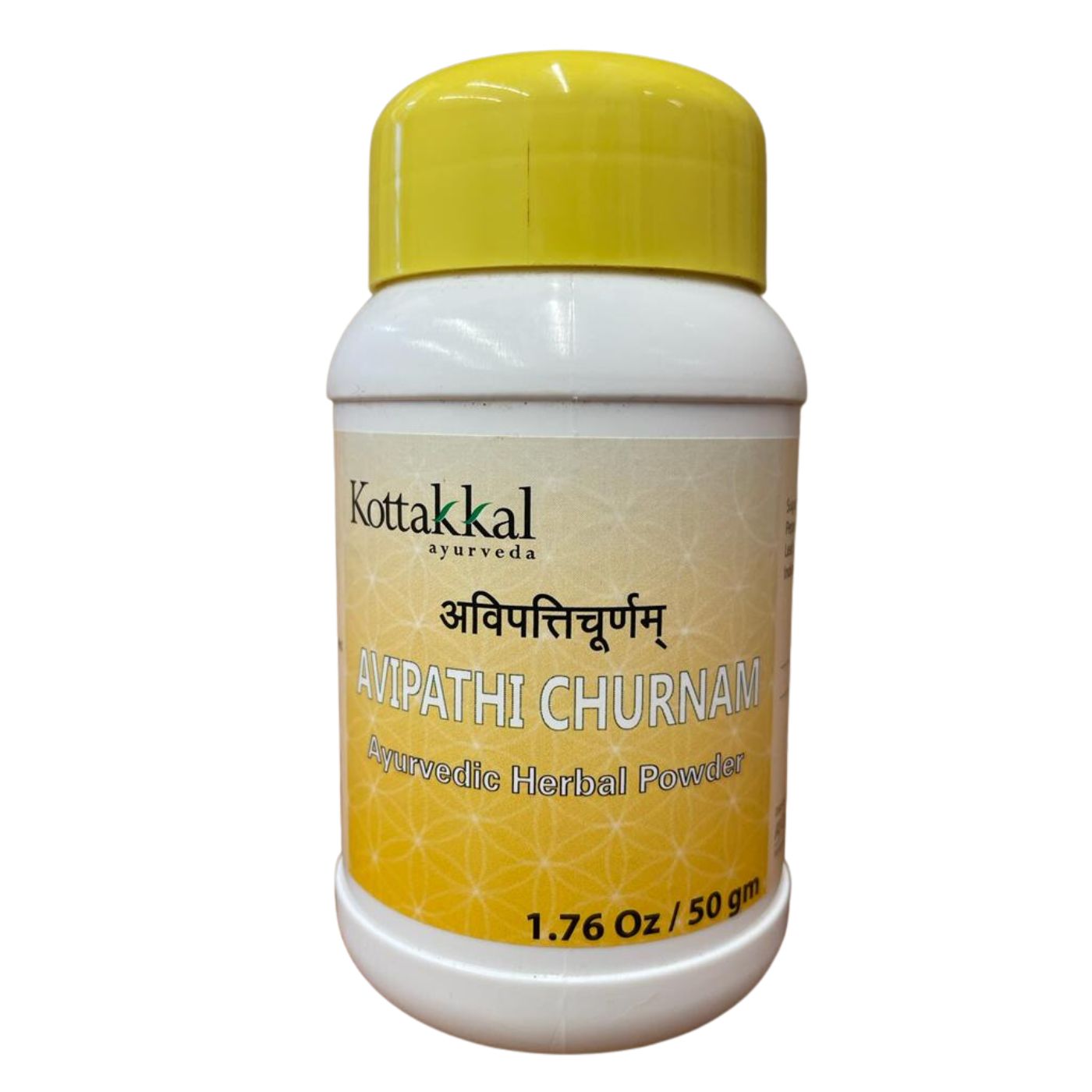A bottle of KT Avipathi Churnam, a Ayurvedic digestive medicine by Kottakkal, with yellow cap and label displaying the product name and weight.