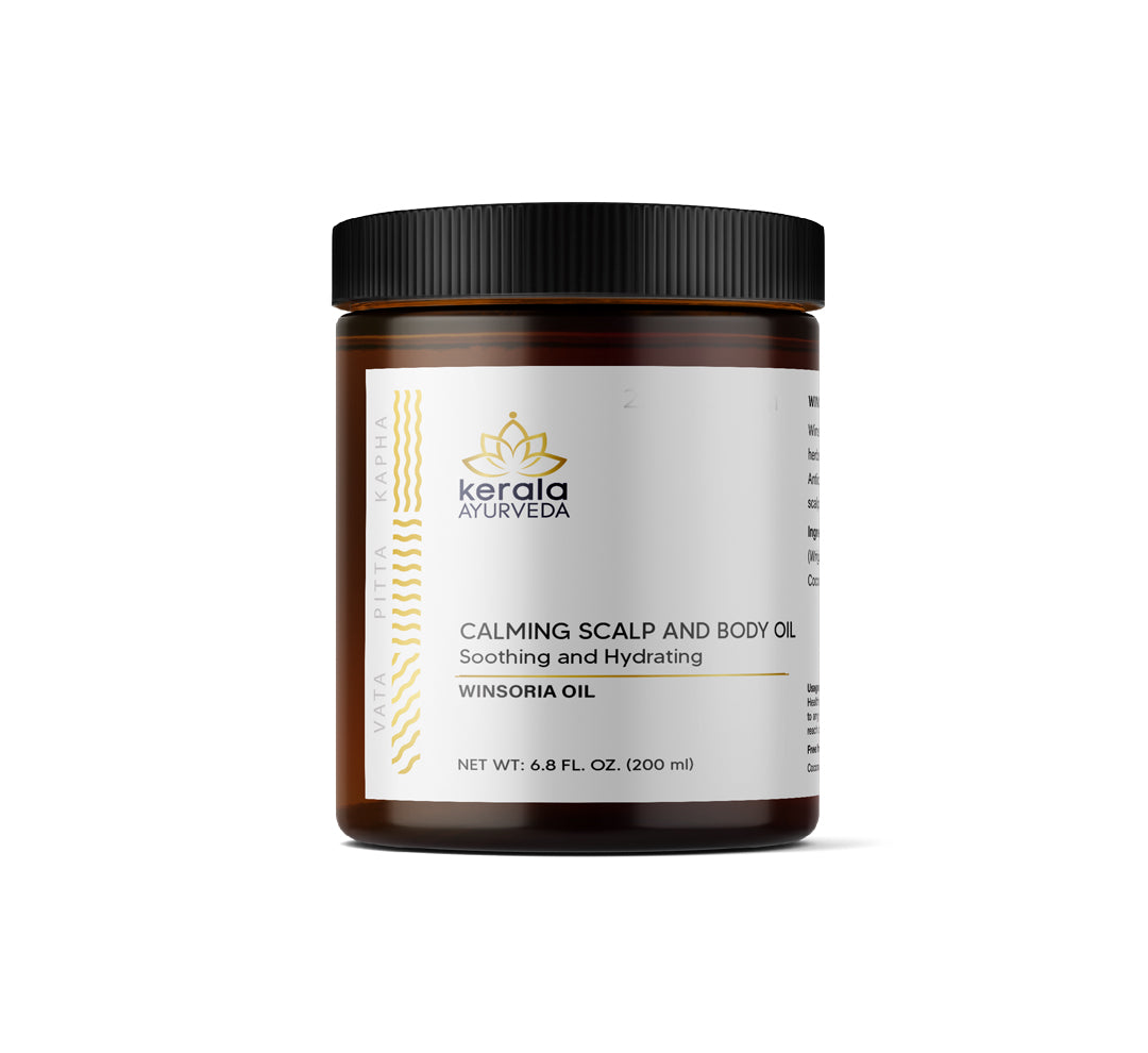 A jar of Kerala Ayurveda Calming Scalp and Body Oil with a label that includes the product name and the brand logo.
