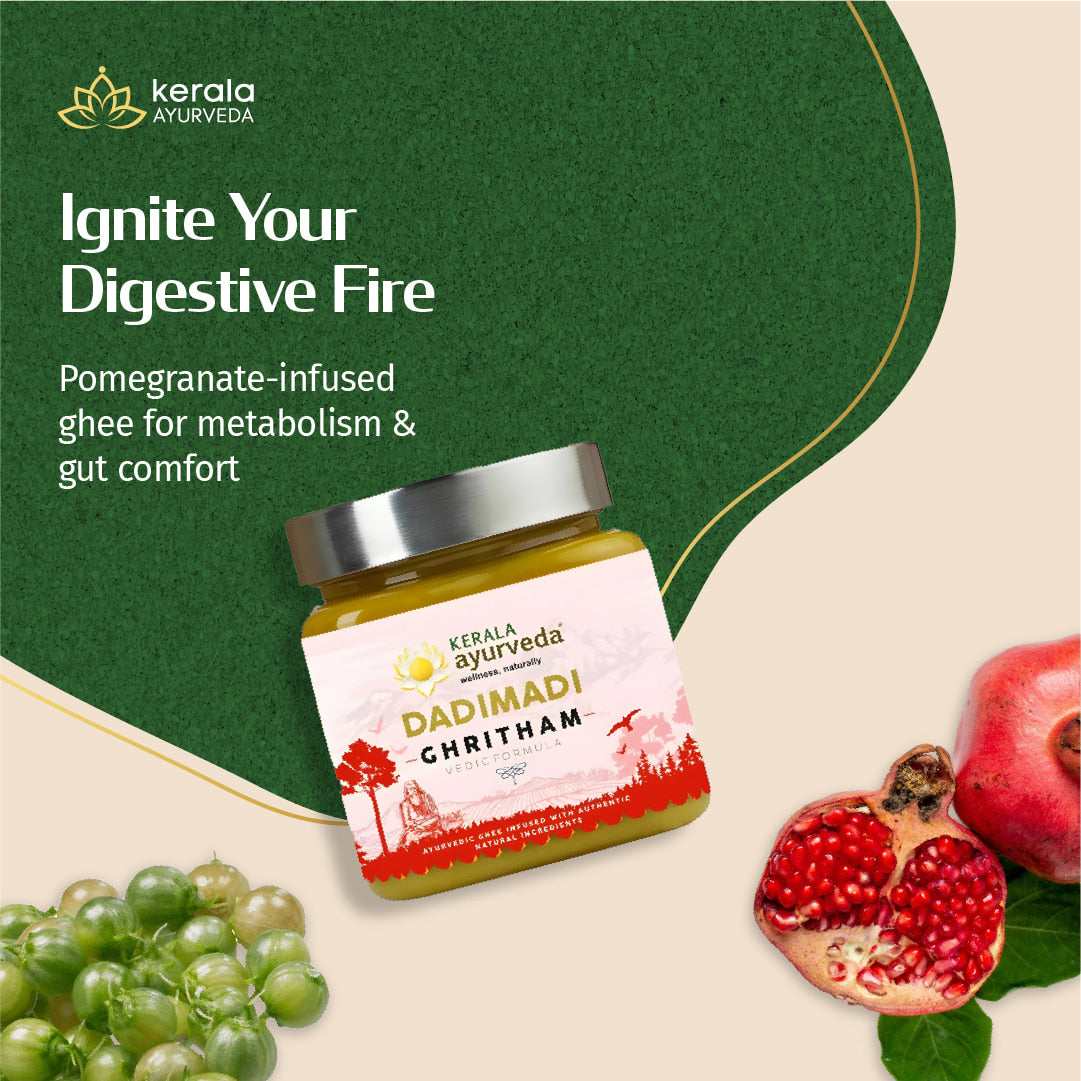 Jar of Kerala Ayurveda Dadi Madi Ghritam with pomegranate and grapes on a green and beige background