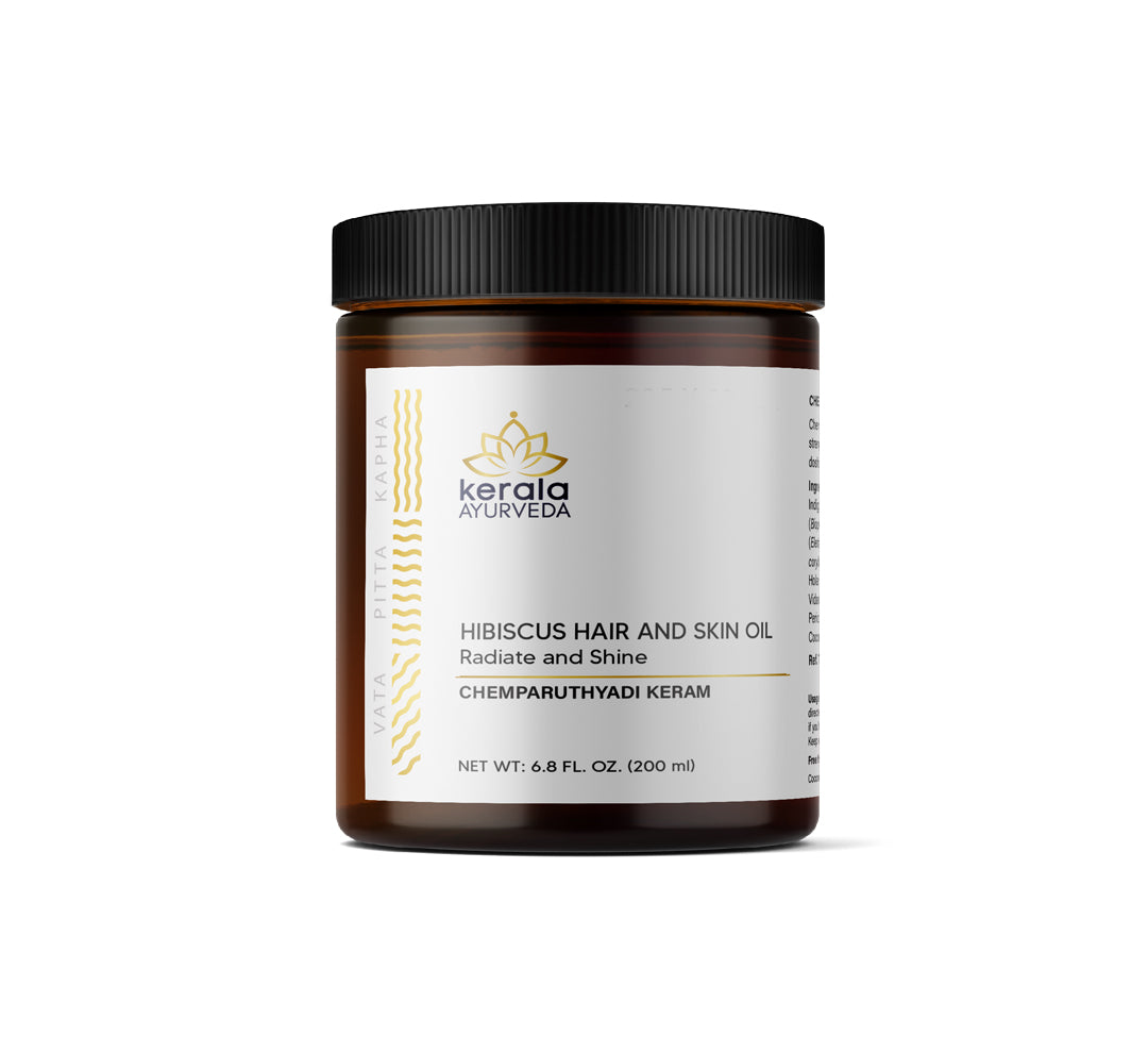 A jar of Kerala Ayurveda Hibiscus Hair and Skin Oil, 6.8 fl oz / 200 ml, with a white label displaying the product name and Ayurvedic herbs.