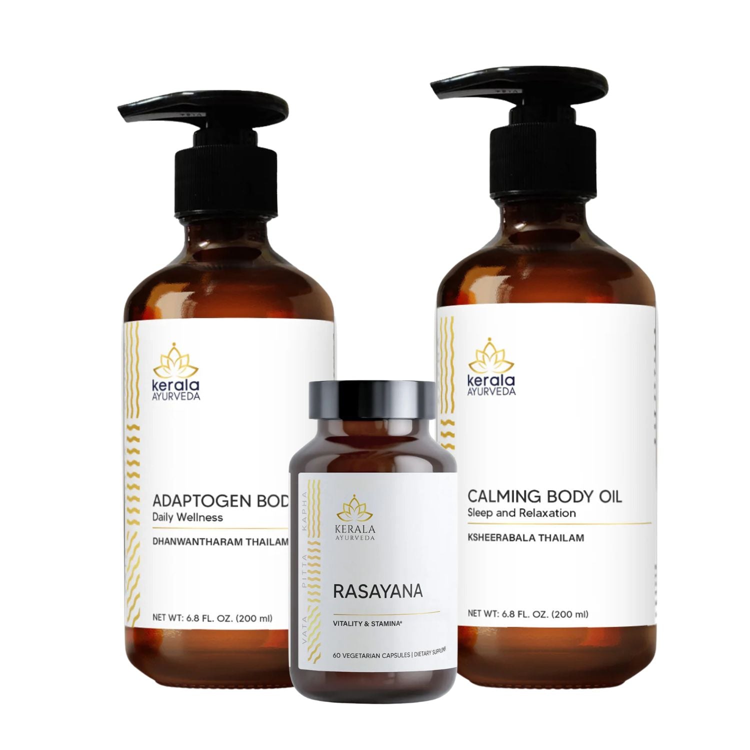 Three products from Kerala Ayurveda including bottles labeled as 'Adaptogen Body Oil', 'Calming Body Oil', and 'Rasayana', with clear liquid inside them, and a small jar of 'Rasayana Capsules' massage oil.