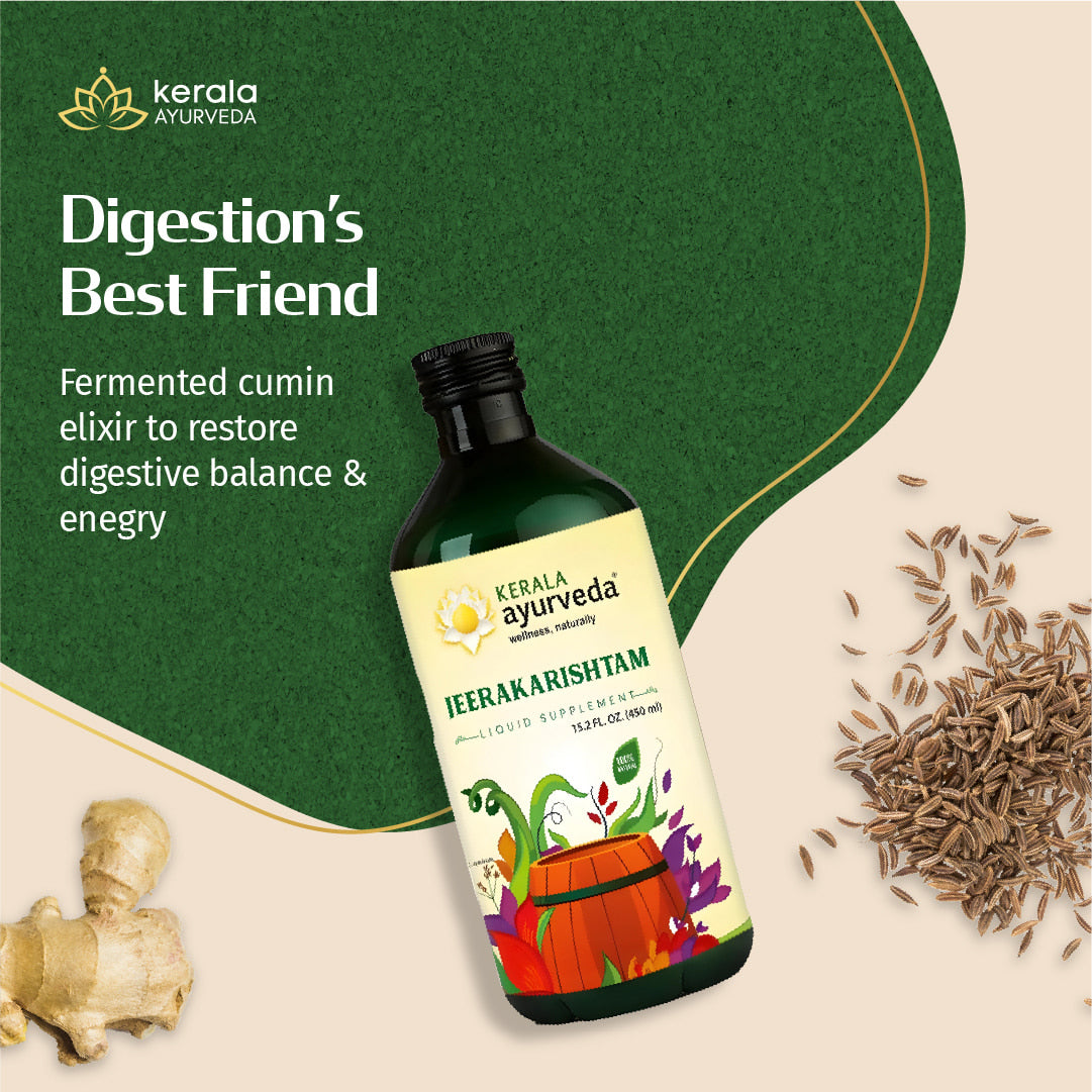 Kerala Ayurveda bottle of Icera Karishtham with cumin seeds and ginger on a green and beige background