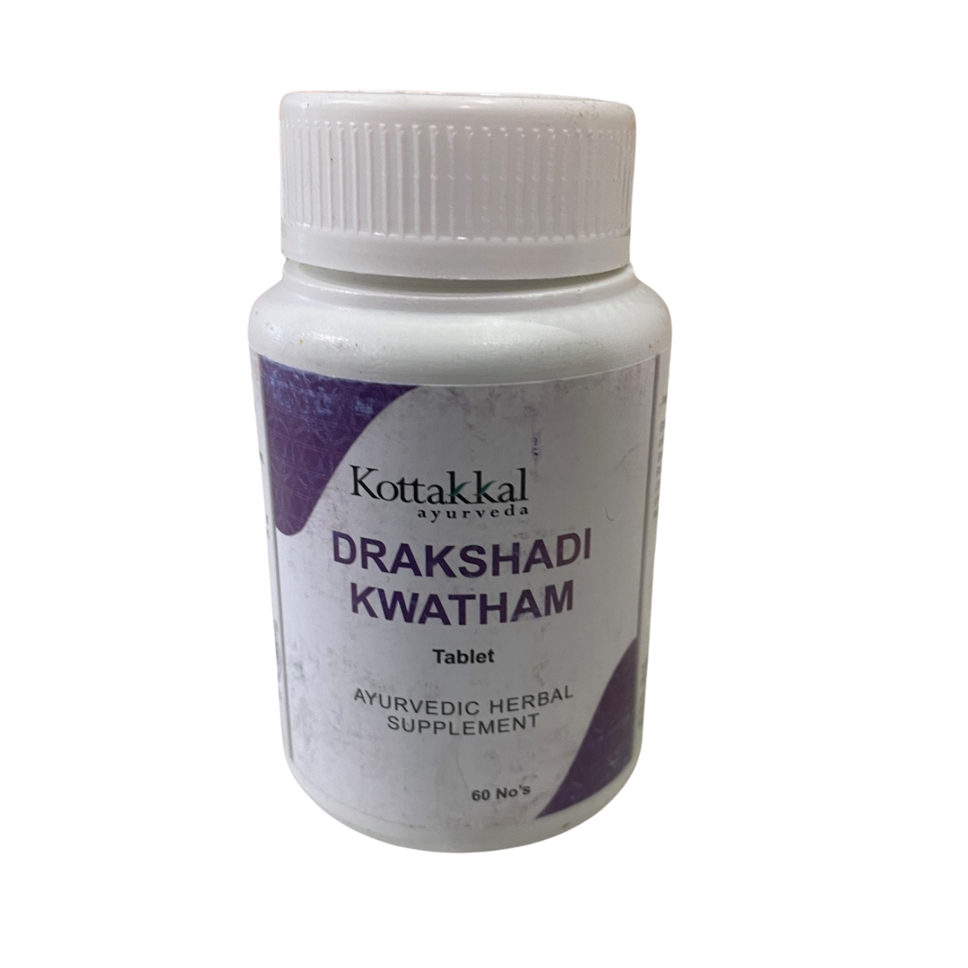 A bottle of KT Drakshadi Kwatham tablets with 60 tablets inside. The label indicates it is an Ayurvedic herbal supplement.