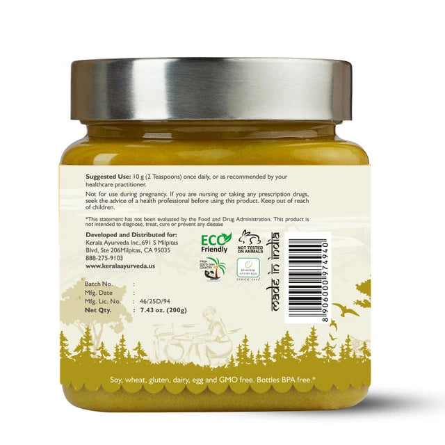 A jar of Kerala Ayurveda Kalyanaka Ghee with a label showing the product name and an illustration of herbs along with how to use suggestion.