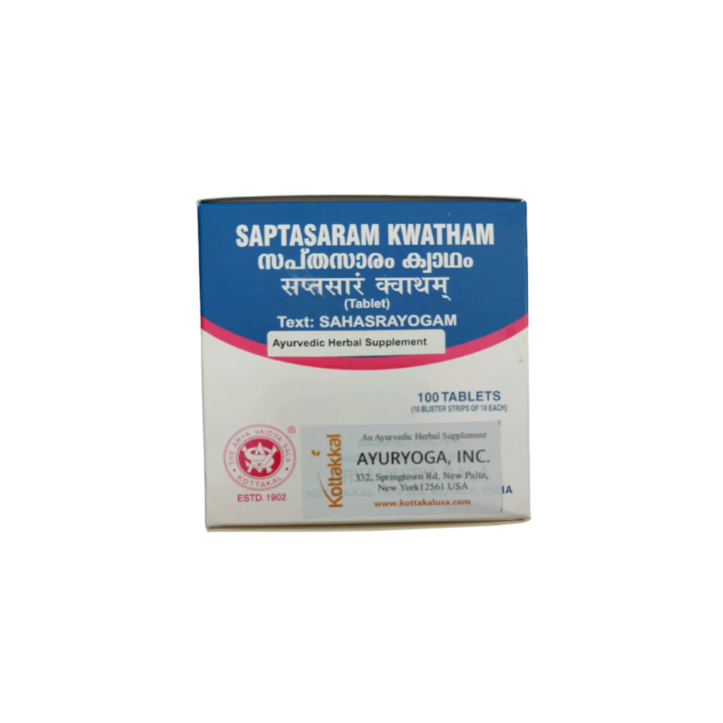 A box of KT Saptasaram Kwatham herbal supplement tablets with 100 tablets inside. The packaging is predominantly white with blue and red accents and text.