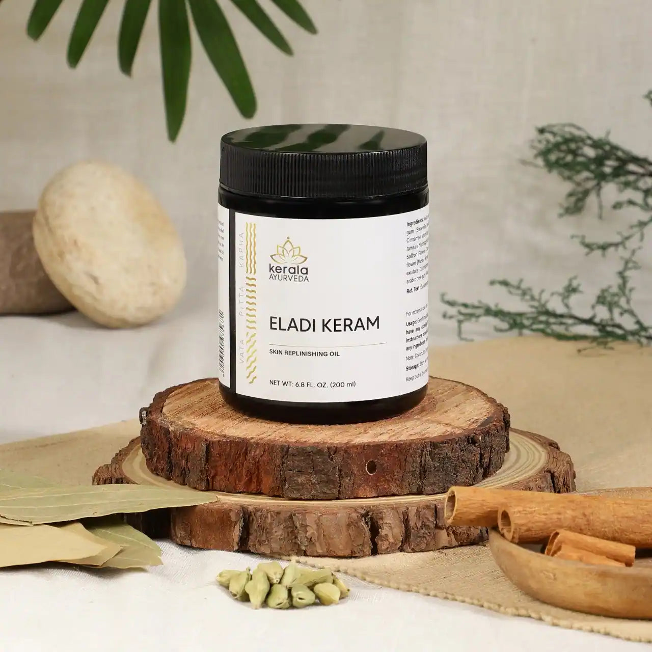 A box of Kerala Ayurveda Eladi Keram, a herbal massage oil, with a capacity of 200 ml.