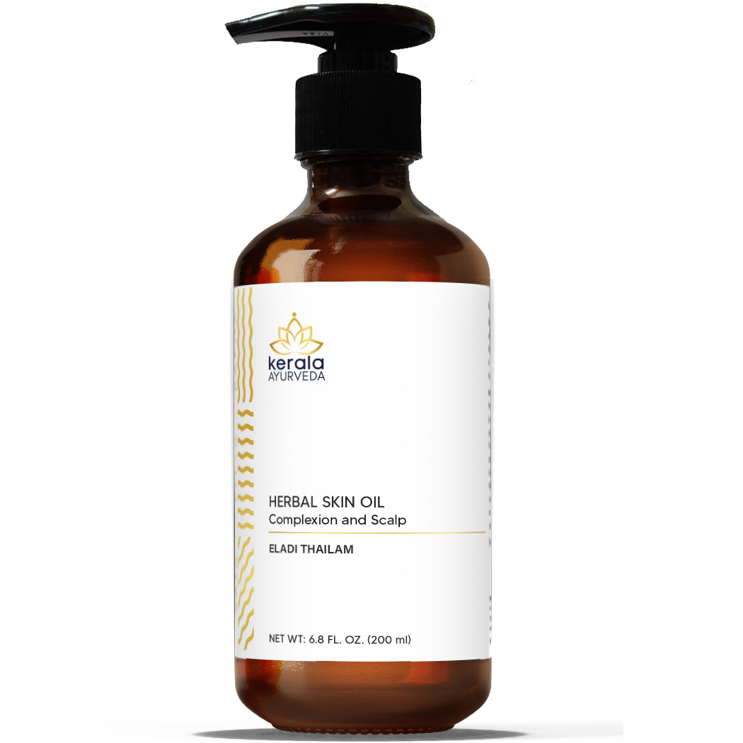 A clear bottle with a pump dispenser, labeled Herbal Skin Oil (Eladi Thailam), with a white background.