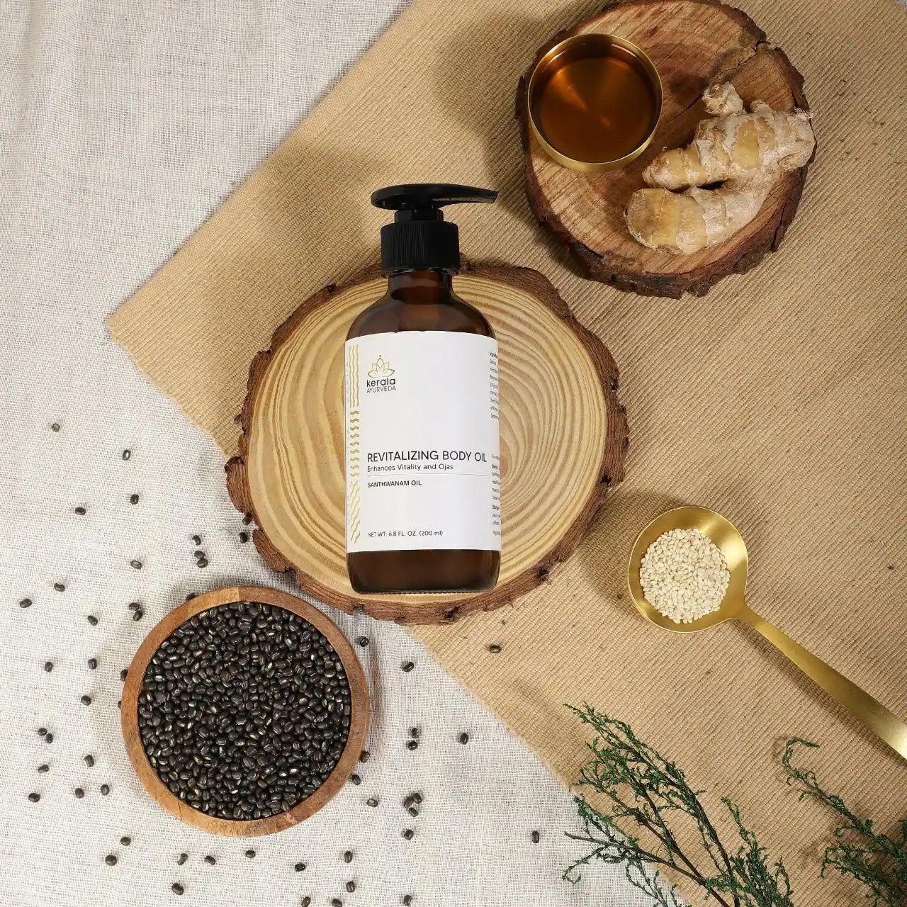 A top view of the bottle of Revitalizing Body Oil with a label that includes the brand name Kerala and the product name