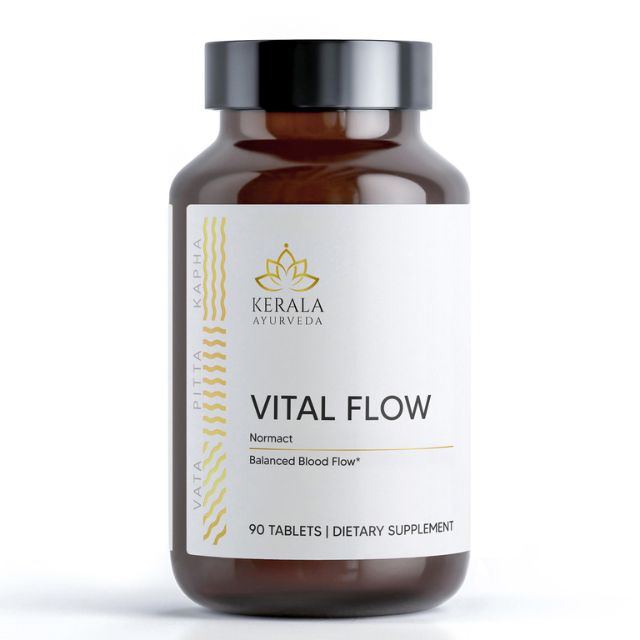 A bottle of Kerala Ayurveda Vital Flow, an ayurvedic oil which contains 90 tablets for dietary supplement, with a label that reads 'Normact Balanced Blood Flow'.